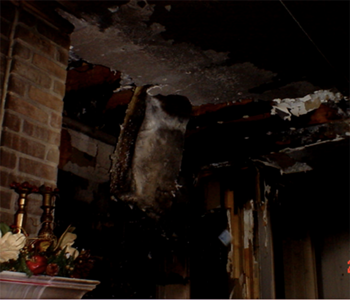 Severe fire damage in a room.